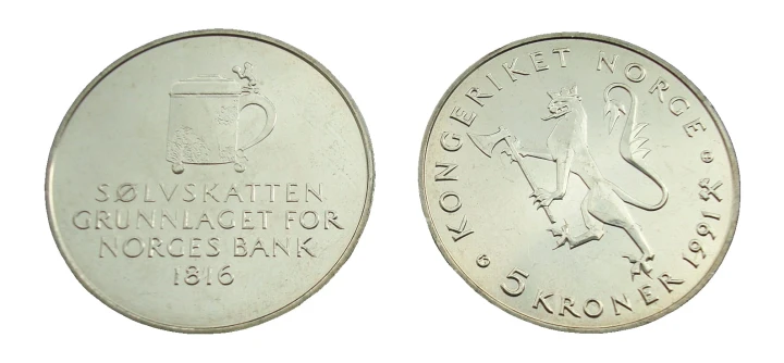 rewers:powyżej centrum monety srebrny kufel; poniżej w czterech wierszach: SØLVSKATTEN / GRUNNLAGET FOR / NORGES BANK / 1816 (srebrny podatek - zalążek Banku Norwegii - 1816)
